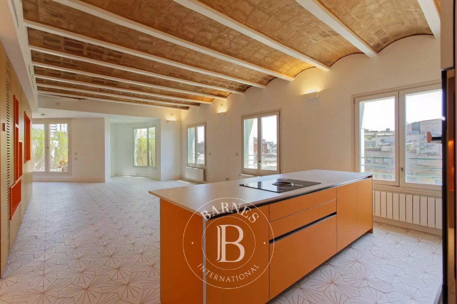 Propietat exclusiva amb terrassa en un edifici històric rehabilitat al cor de Barcelona